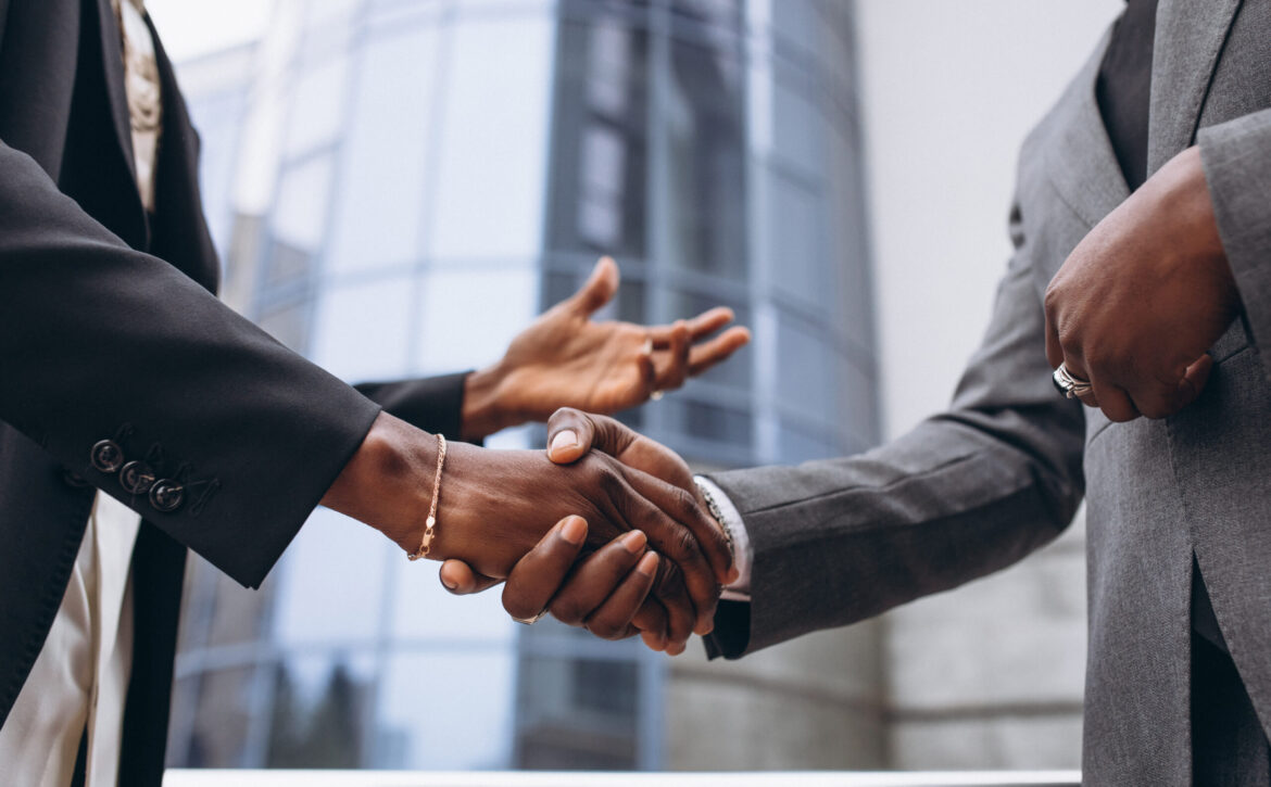 African business male people shaking hands