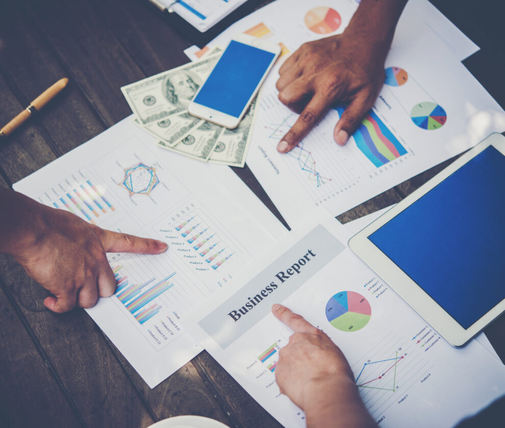 Group of business people analysis with marketing report graph, Y