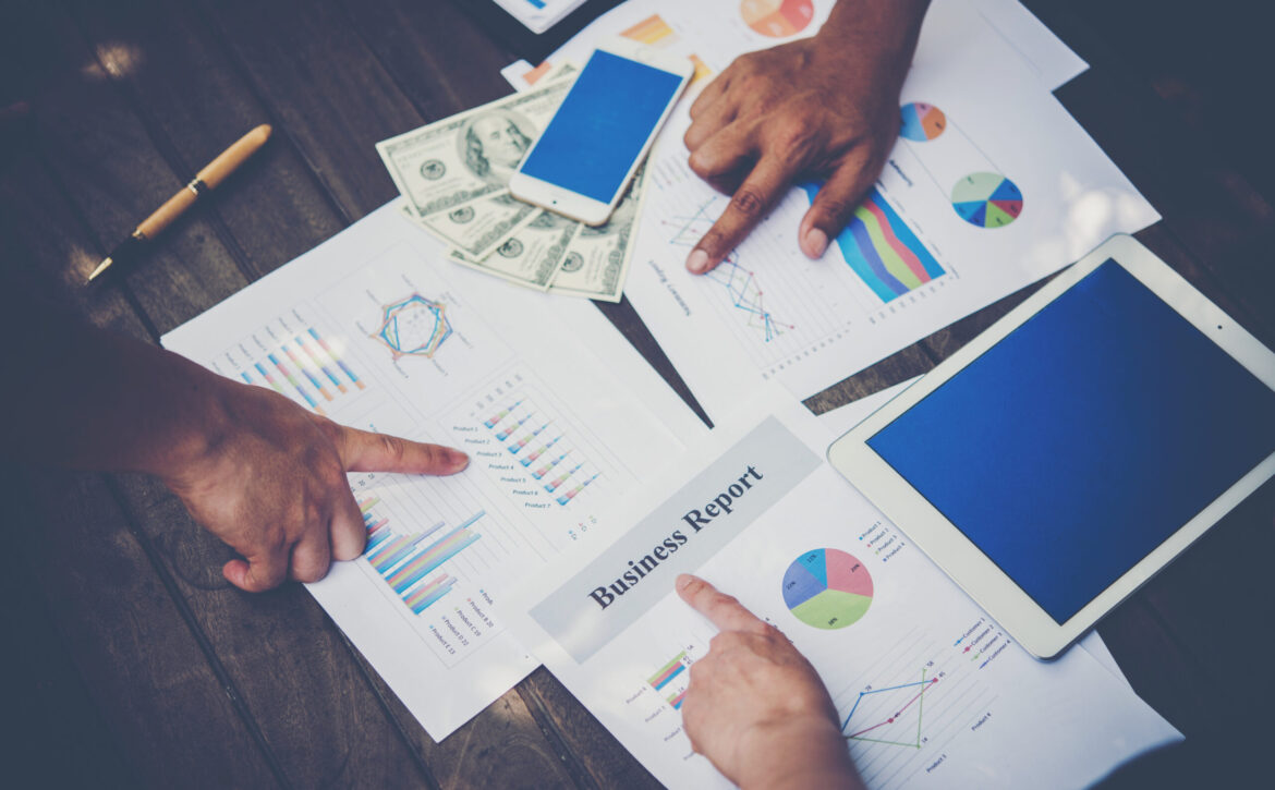 Group of business people analysis with marketing report graph, Y